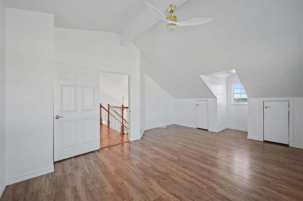 1781 South Munson Road Royse City, TX 75189 - Photo 25 of 33 an empty room with wooden floor and ceiling fan