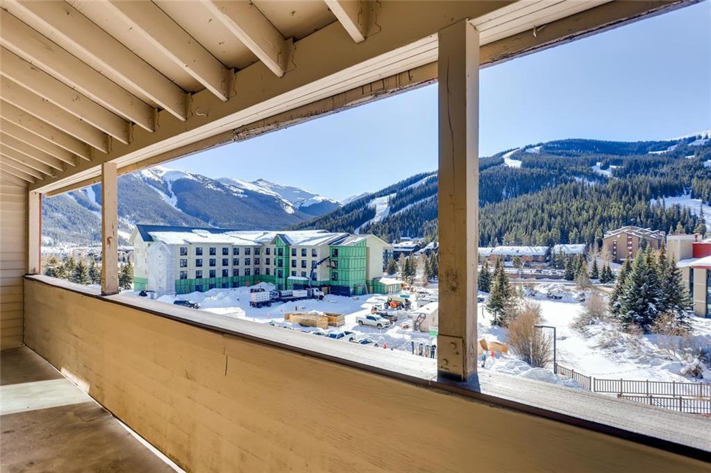 760 Copper Road, Unit 201 Copper Mountain, CO 80443 - Photo 26 of 28 a view of a living room with a wooden fence