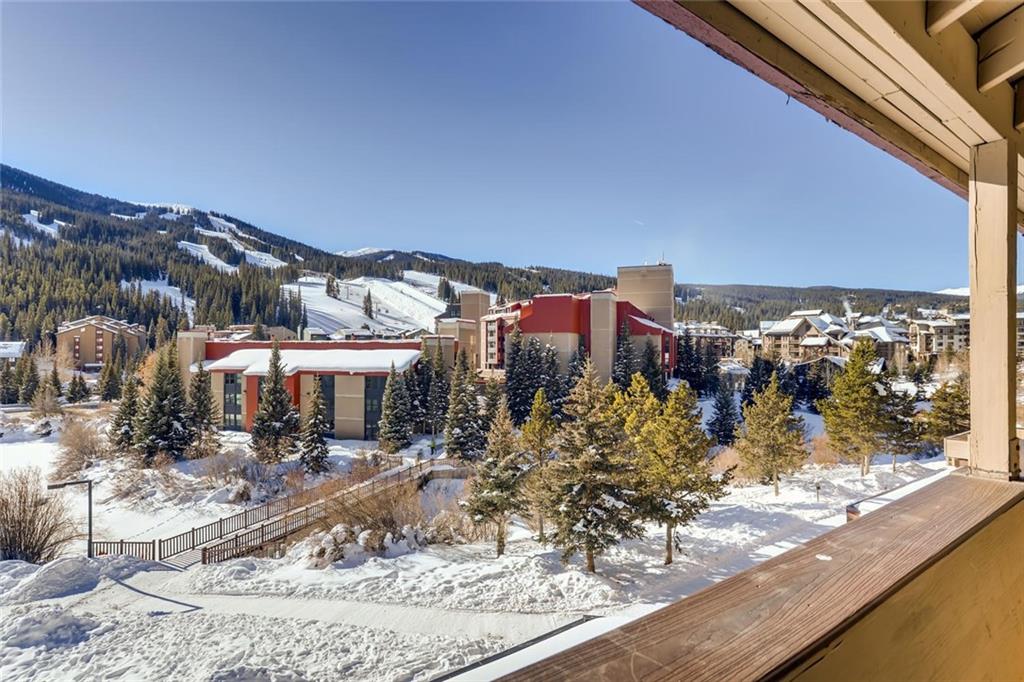 760 Copper Road, Unit 201 Copper Mountain, CO 80443 - Photo 27 of 28 a view of a house with a yard and sitting area