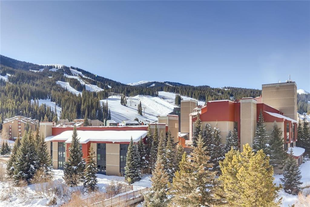 760 Copper Road, Unit 201 Copper Mountain, CO 80443 - Photo 28 of 28 an aerial view of a house with a yard and mountain view