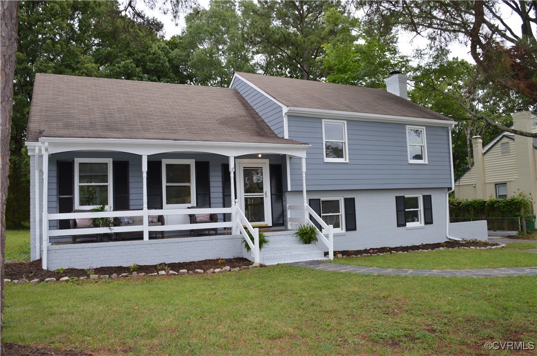 a house view with a garden space