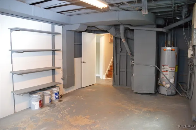 a view of empty room with wooden floor and windows