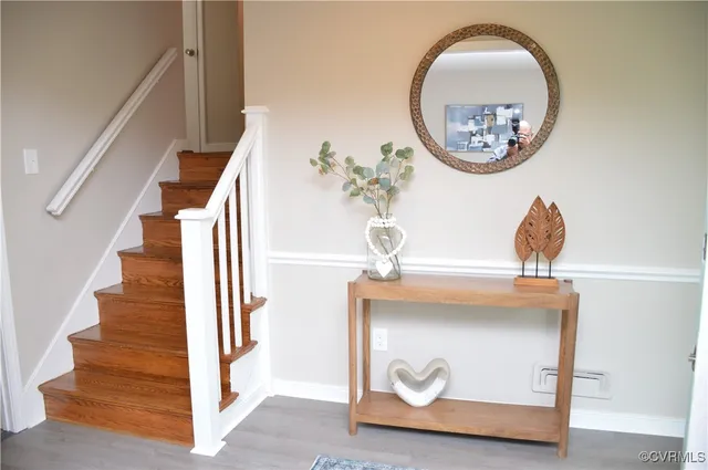 a view of entryway with wooden floor