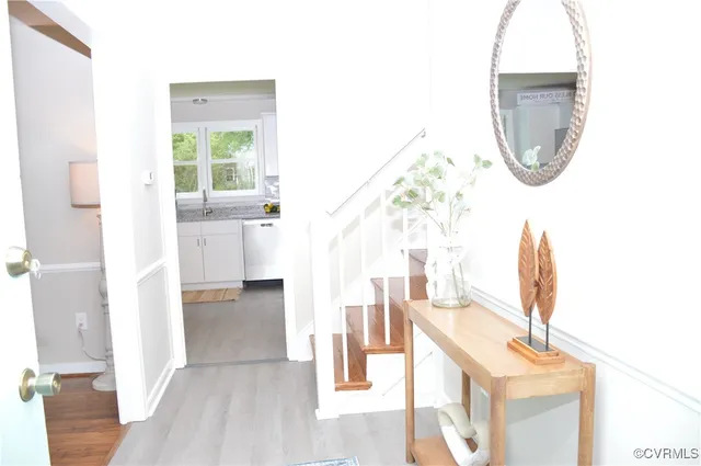 a view of a living room with a bathroom