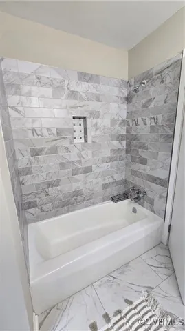 a bathroom with a bathtub