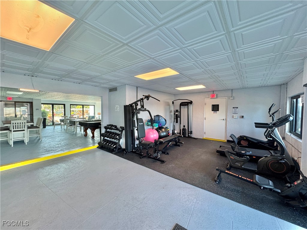 2711 First Street, Unit 102 Fort Myers, FL 33916 - Photo 33 of 36 a view of a room with gym equipment