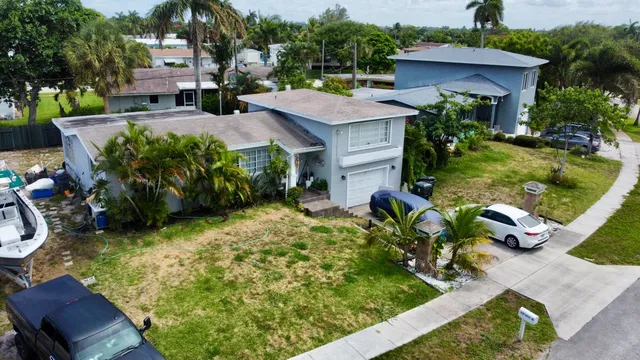 a aerial view of a house with garden
