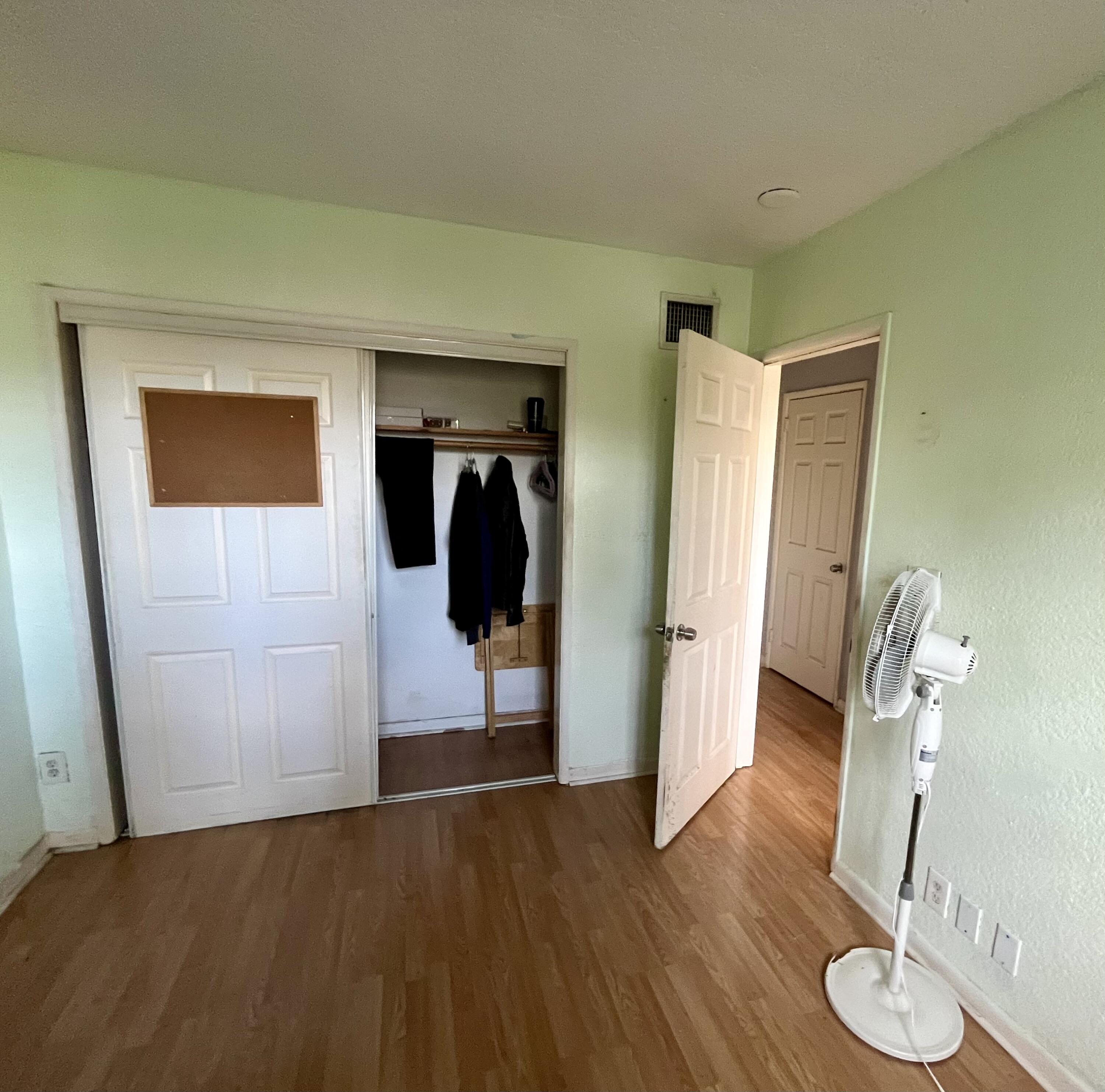 1424 Crest Drive Lake Worth, FL 33461 - Photo 10 of 16 a view of a livingroom with furniture and wooden floor