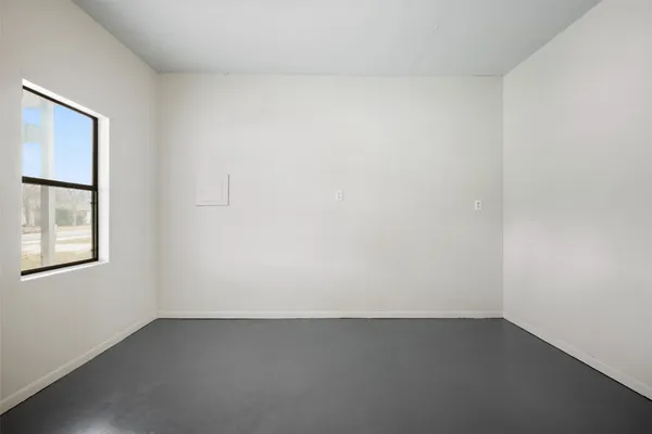 an empty room with a window