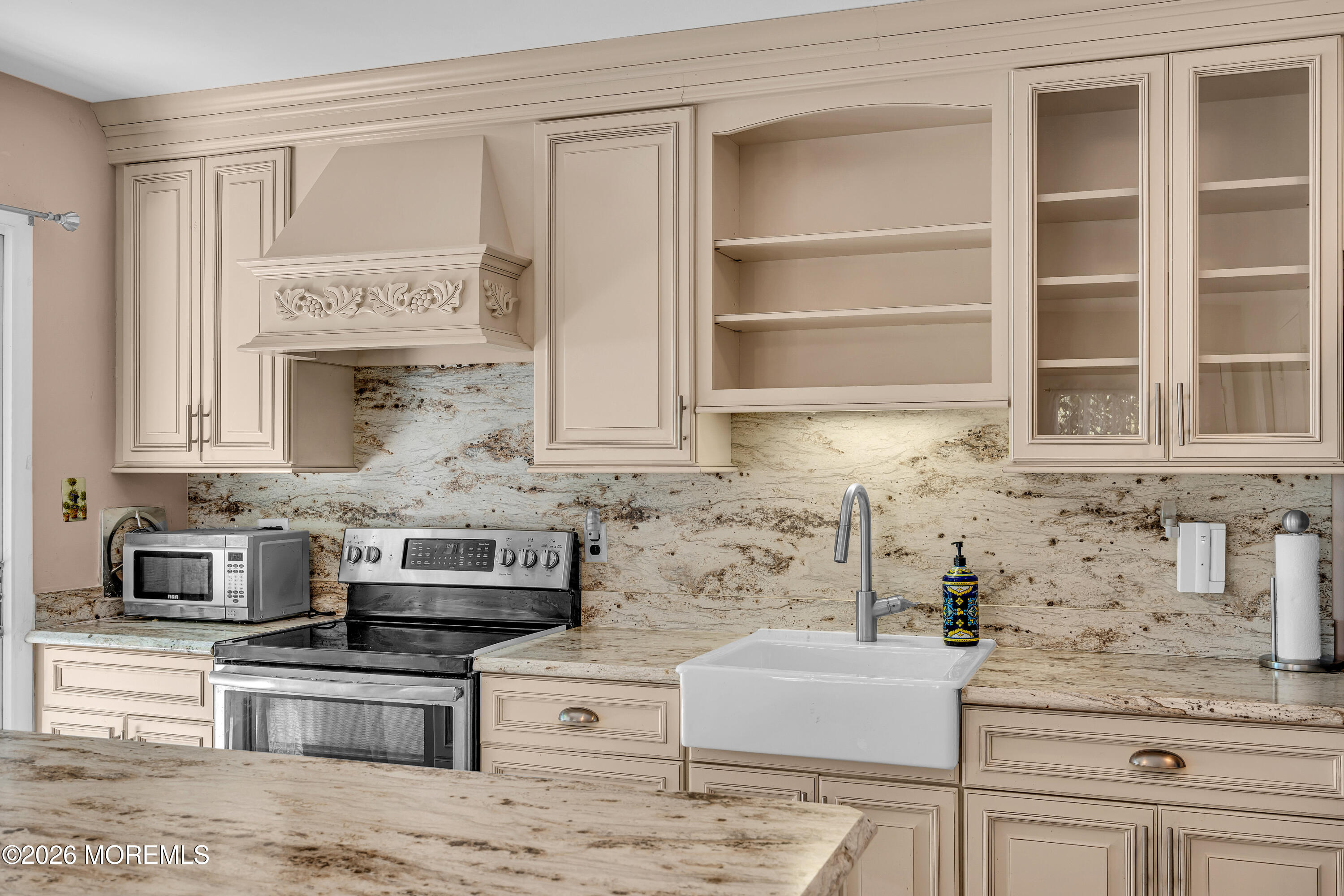 12 Vermont Way Whiting, NJ 08759 - Photo 16 of 27 a kitchen with granite countertop a stove and a sink