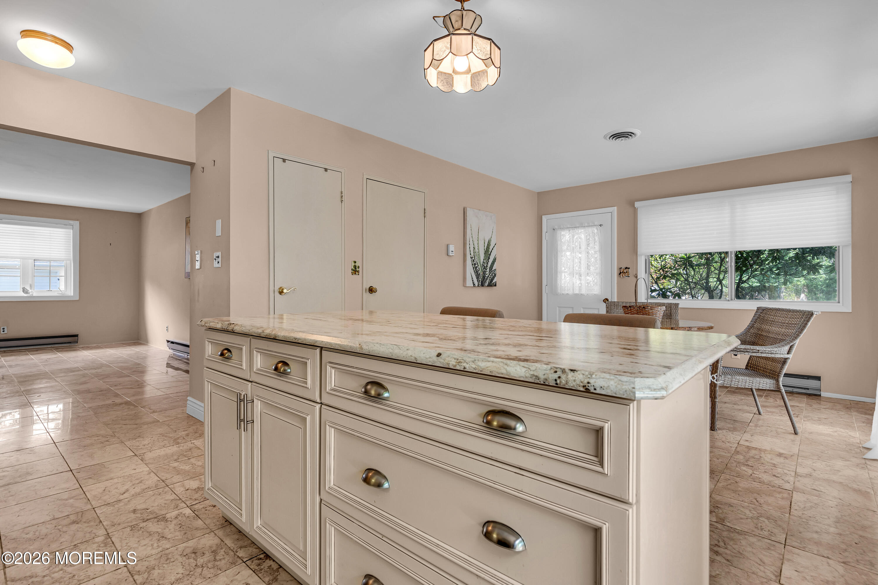 12 Vermont Way Whiting, NJ 08759 - Photo 17 of 27 a kitchen with granite countertop a stove and a sink