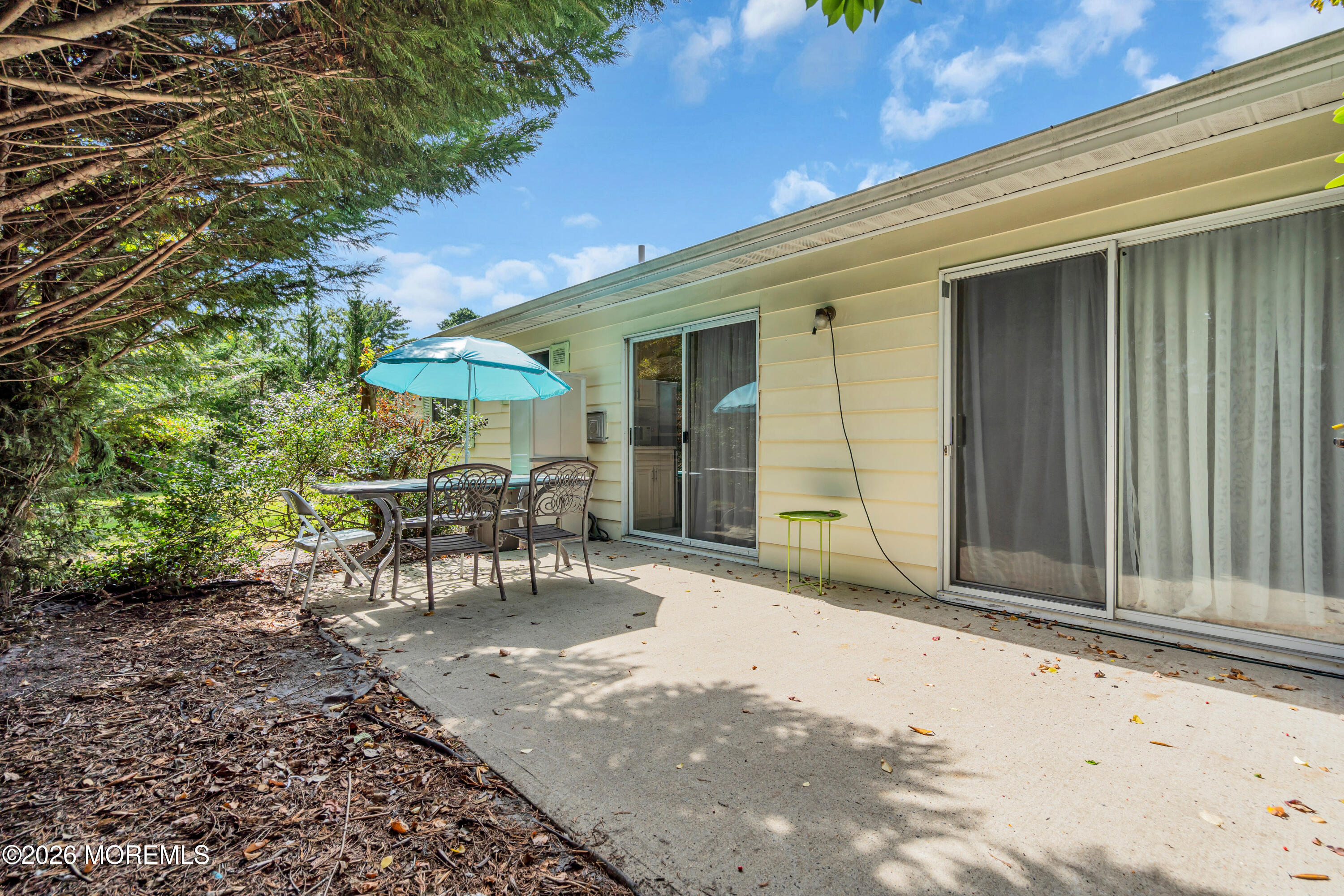 12 Vermont Way Whiting, NJ 08759 - Photo 25 of 27 a view of a backyard with sitting area
