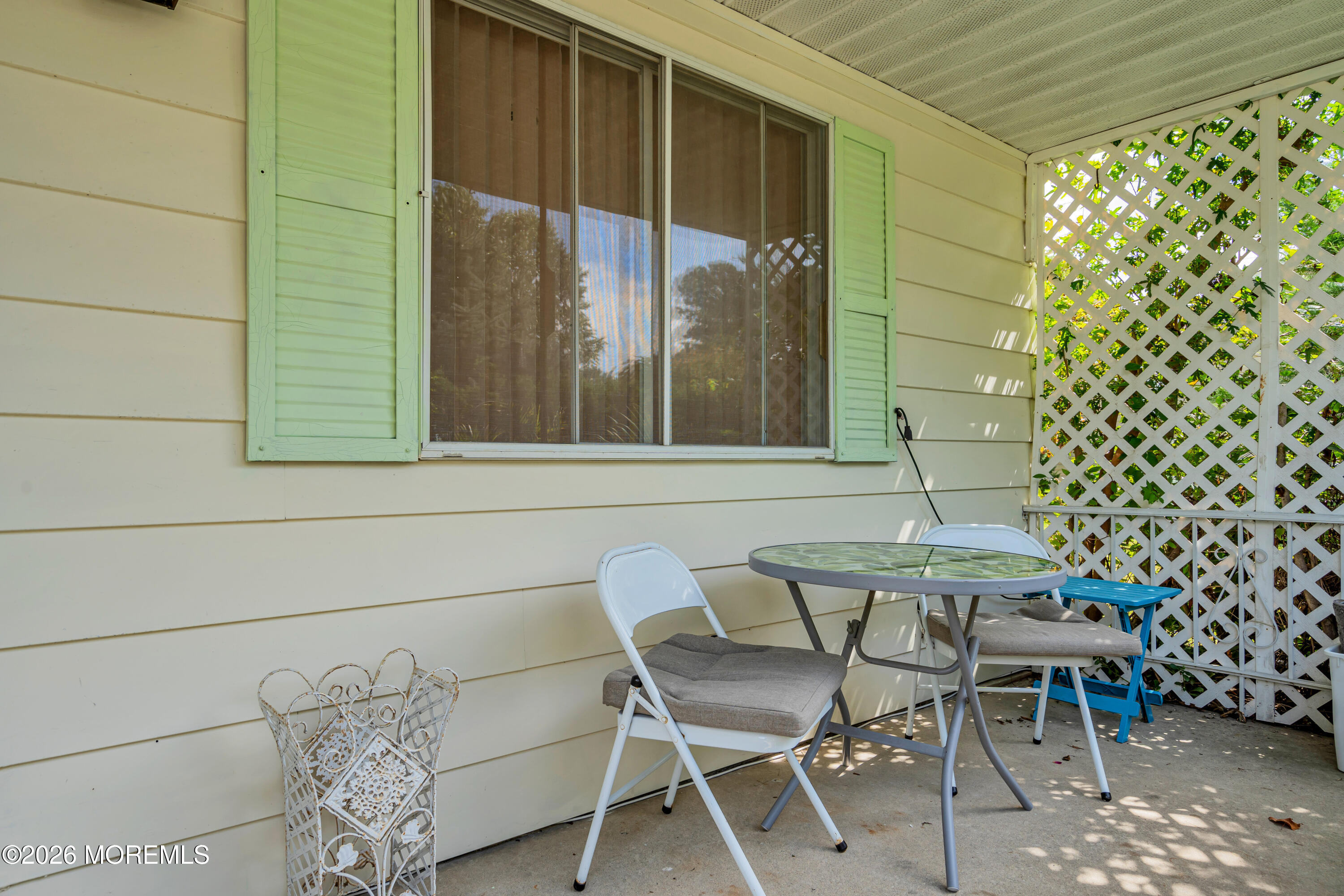 12 Vermont Way Whiting, NJ 08759 - Photo 26 of 27 a balcony with table and chairs