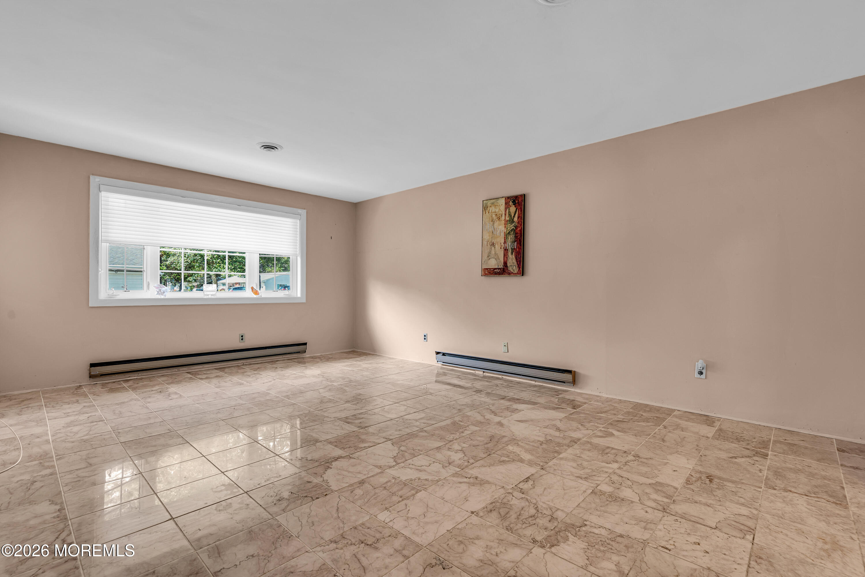 12 Vermont Way Whiting, NJ 08759 - Photo 7 of 27 a view of an empty room with a window