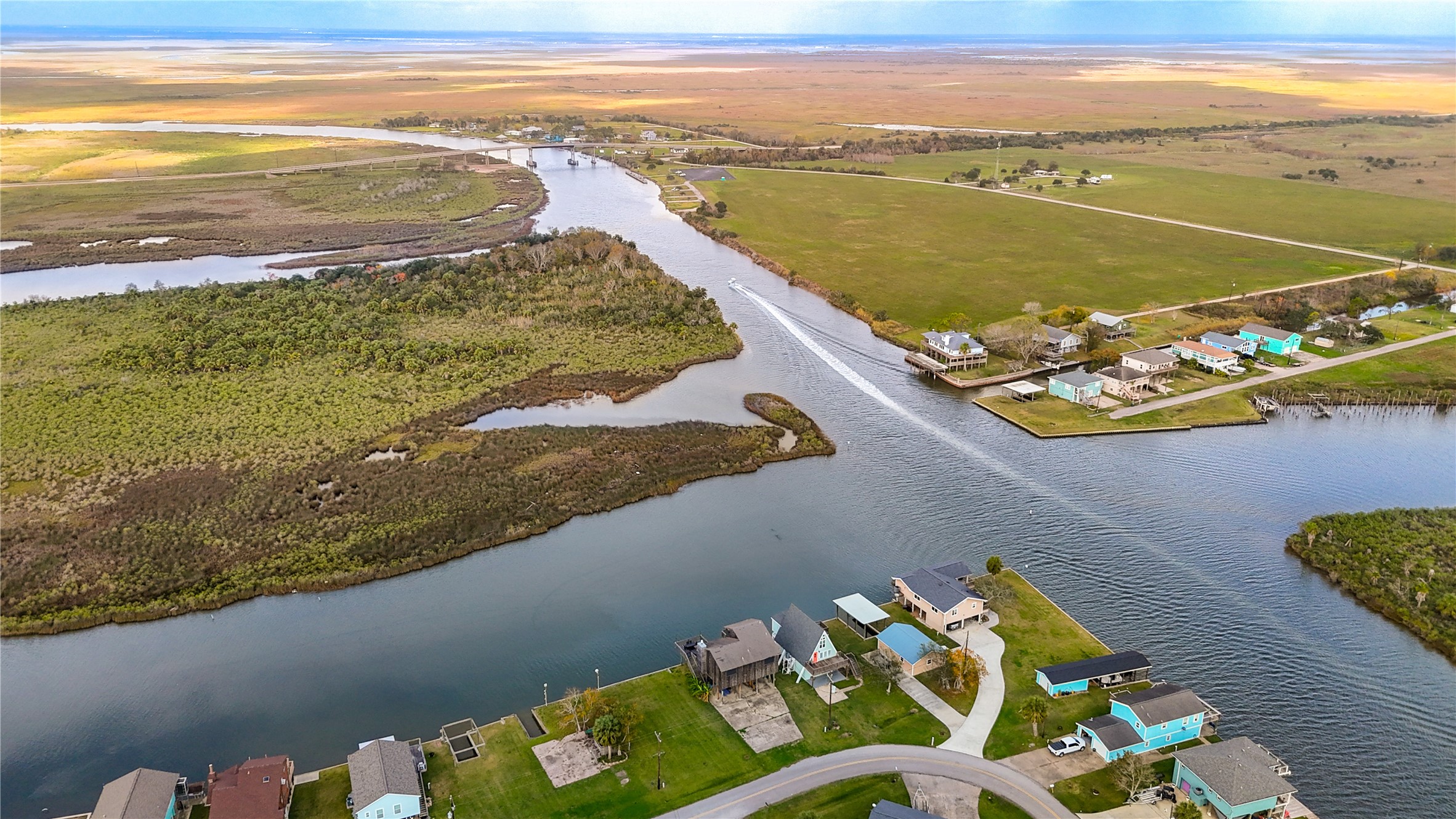 239 Redfish Drive Freeport, TX 77541 - Photo 25 of 25 a view of an ocean from a building