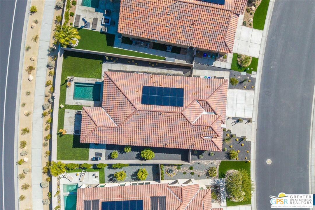 64 Claret Road Rancho Mirage, CA 92270 - Photo 11 of 30 a small white building with a white roof