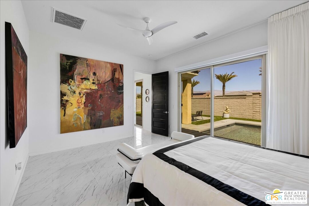 64 Claret Road Rancho Mirage, CA 92270 - Photo 22 of 30 a room with furniture and window