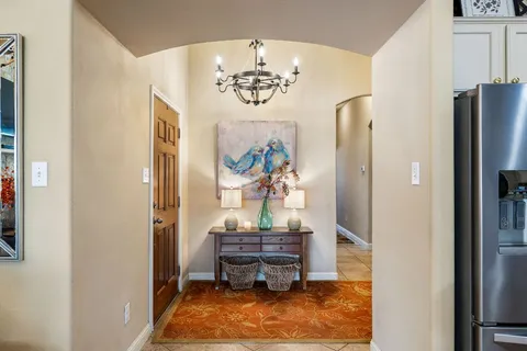 a view of dining room with hallway