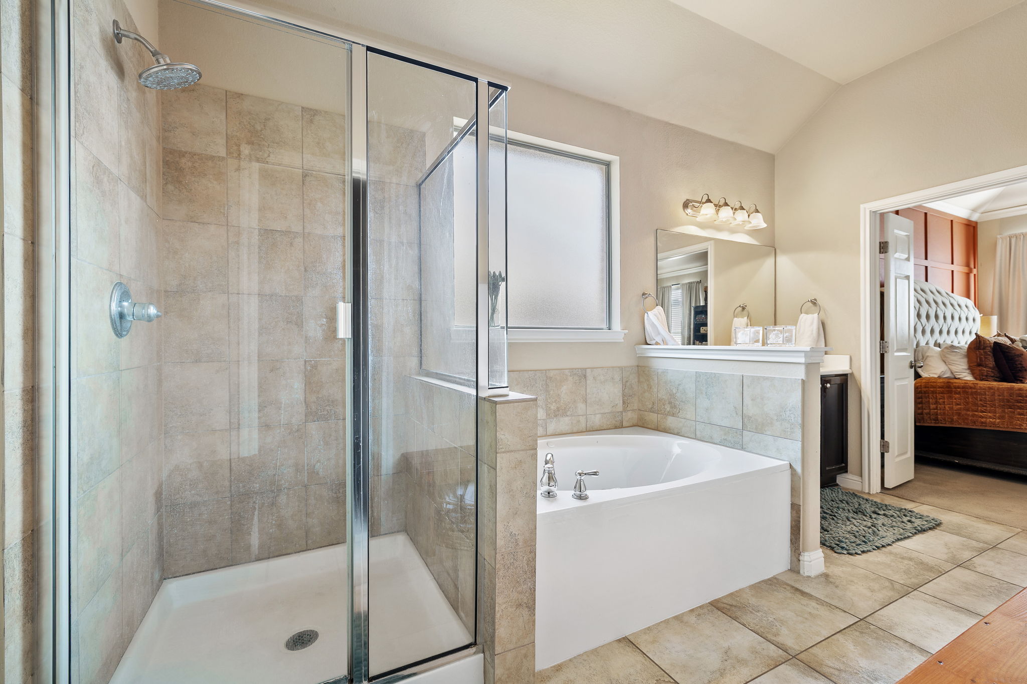 2494 Santa Barbara Loop Round Rock, TX 78665 - Photo 24 of 35 a bathroom with a tub a sink and a shower