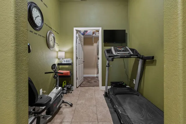 a view of a room with gym equipment
