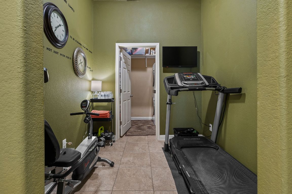 2494 Santa Barbara Loop Round Rock, TX 78665 - Photo 30 of 35 a view of a room with gym equipment