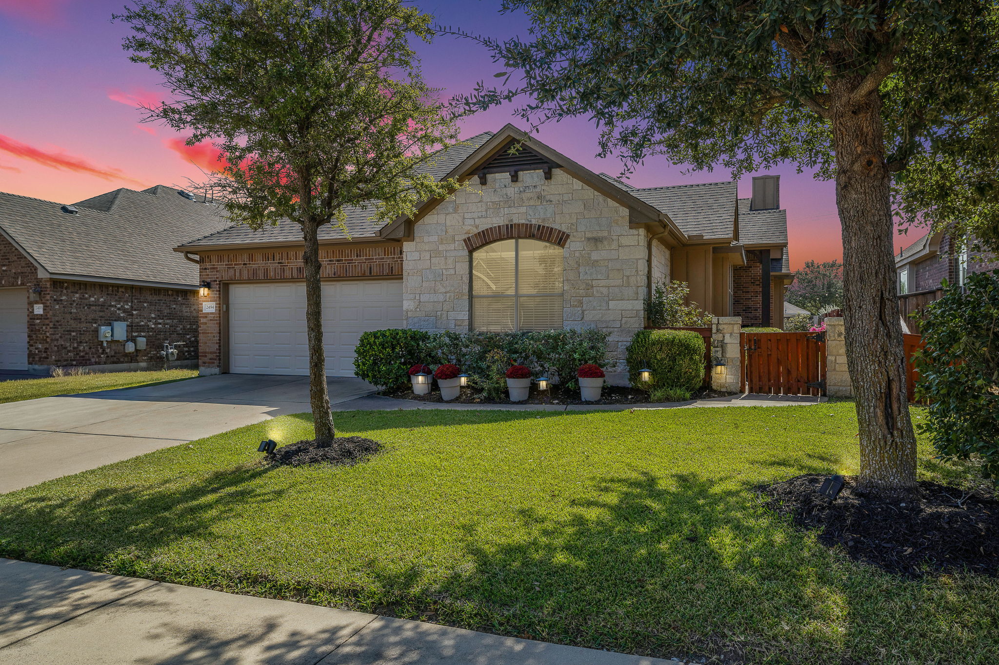 2494 Santa Barbara Loop Round Rock, TX 78665 - Photo 3 of 35 a front view of a house with garden