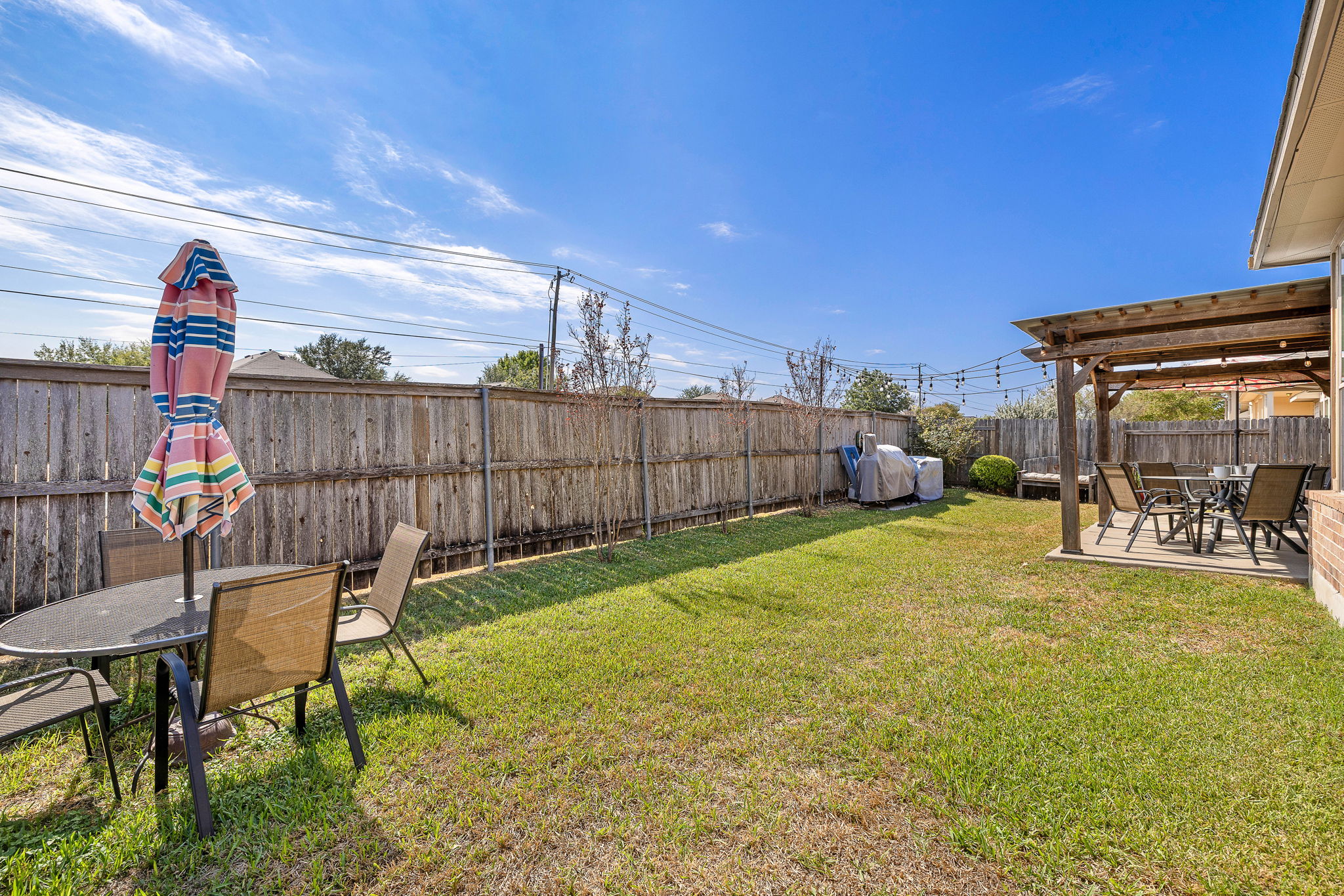 2494 Santa Barbara Loop Round Rock, TX 78665 - Photo 34 of 35 a view of a backyard with sitting area