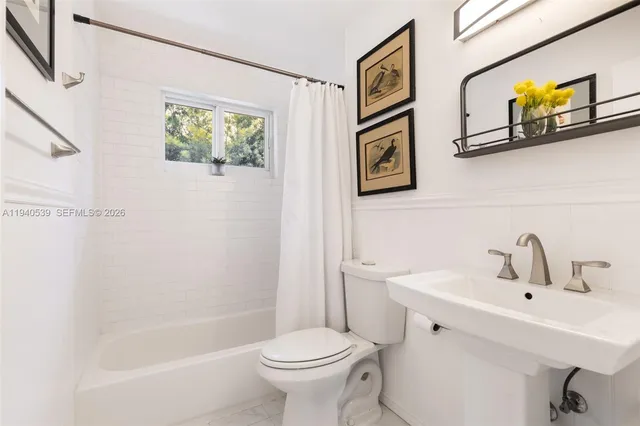 a bathroom with a sink and a toilet
