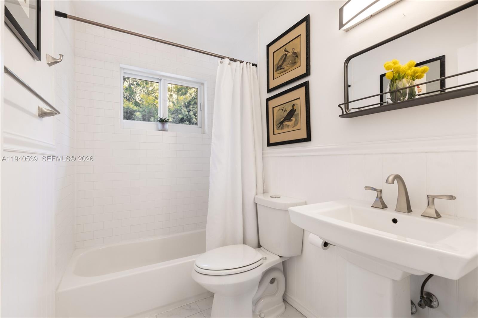 2201 Southwest 22nd Terrace Miami, FL 33145 - Photo 22 of 25 a bathroom with a sink and a toilet