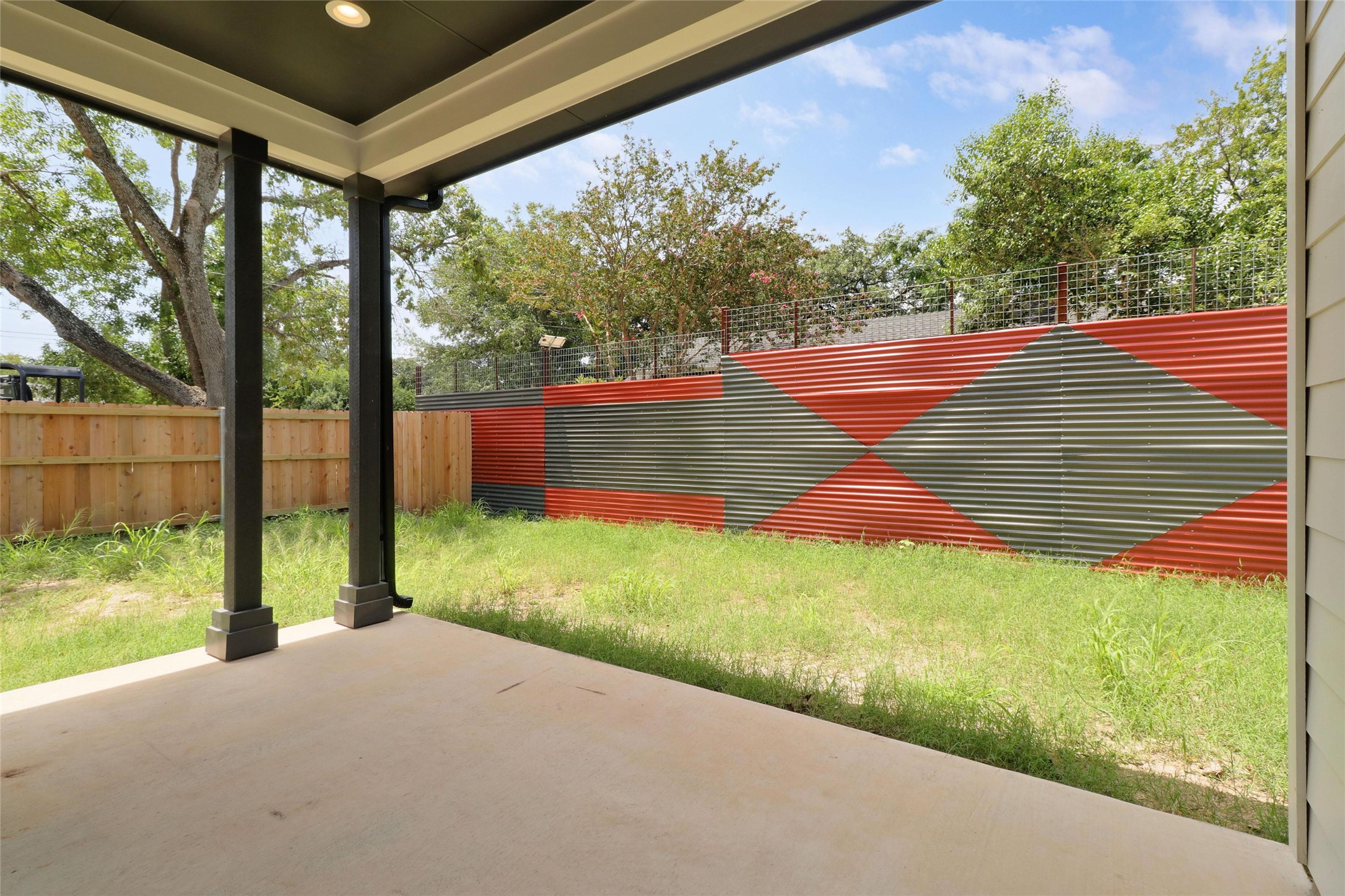 200 West Goforth Road, Unit 1 Buda, TX 78610 - Photo 24 of 25 covered back patio and private yard.