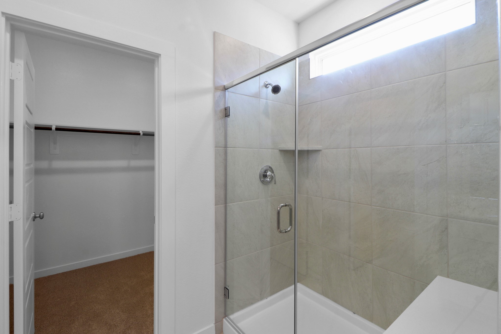 2614 Cactus Ranch Lane Crosby, TX 77532 - Photo 11 of 24 a bathroom with a shower and a glass door