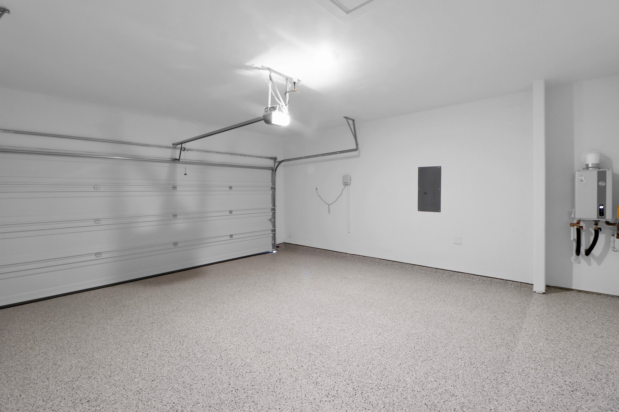 2614 Cactus Ranch Lane Crosby, TX 77532 - Photo 19 of 24 a view of a room with racks on the wall