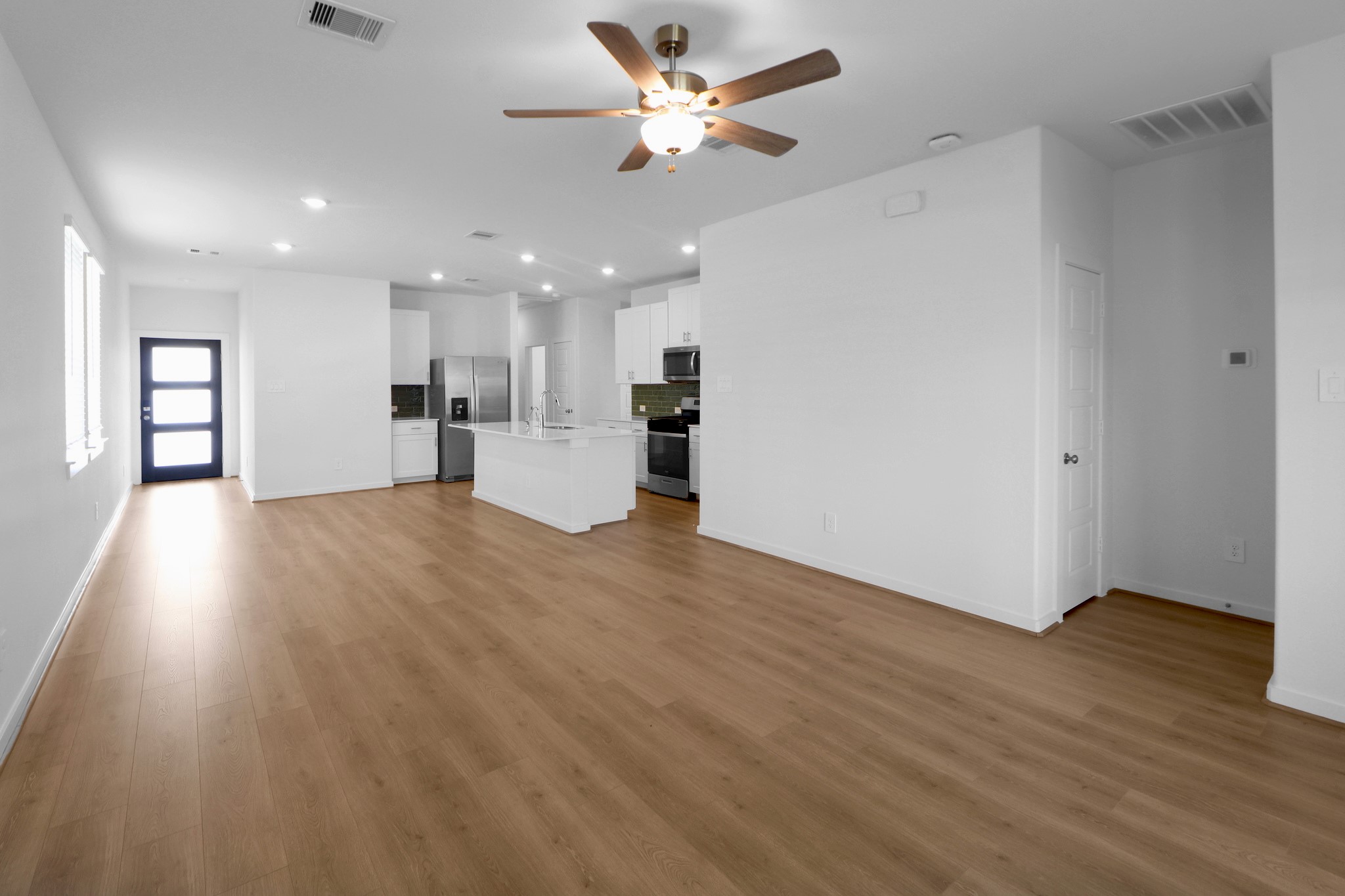 2614 Cactus Ranch Lane Crosby, TX 77532 - Photo 6 of 24 a view of a kitchen with a sink and a window