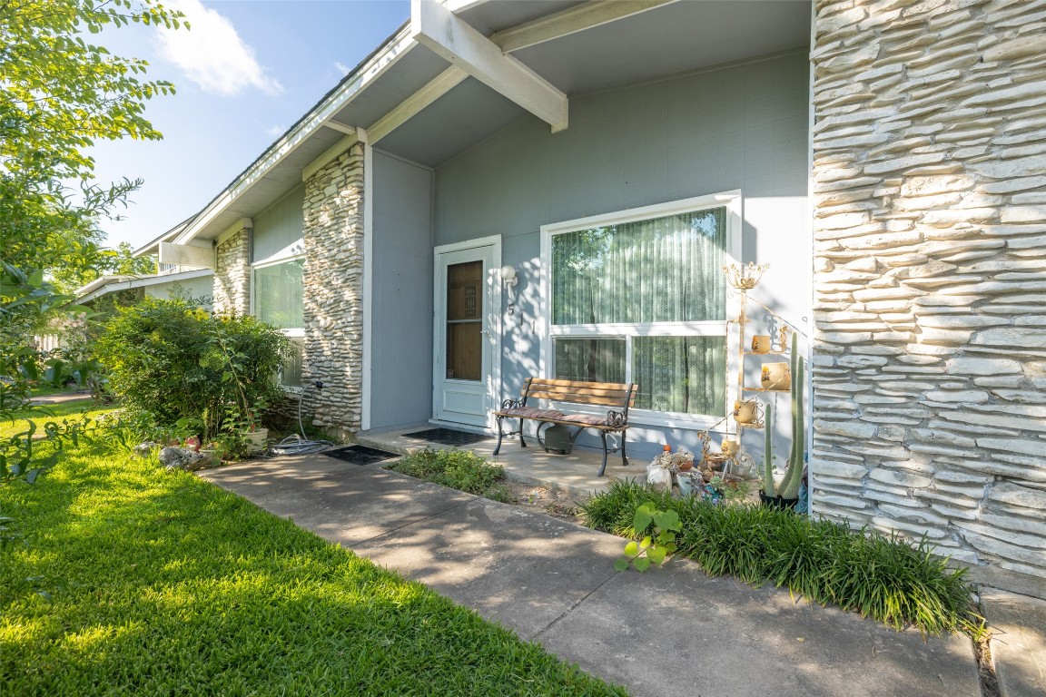 511 Arbor Lane Austin, TX 78745 - Photo 1 of 1 a garden view with a sitting space