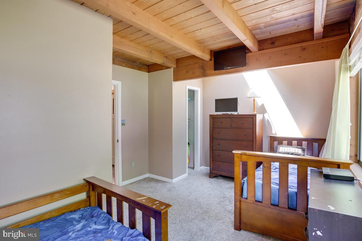 3581 Yellow Bank Road Dunkirk, MD 20754 - Photo 36 of 93 Wood beam ceilings, carpet, large windows