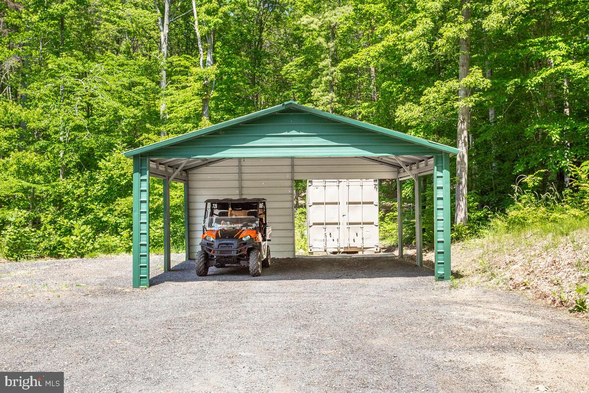 3581 Yellow Bank Road Dunkirk, MD 20754 - Photo 5 of 93 Large covered carport plus sea carton for storage