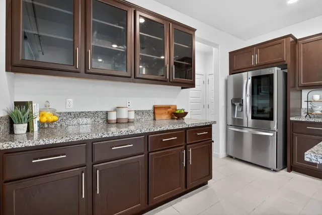 a bathroom with a tub shower and a sink