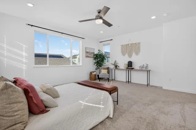 a view of a lake with houses in the back