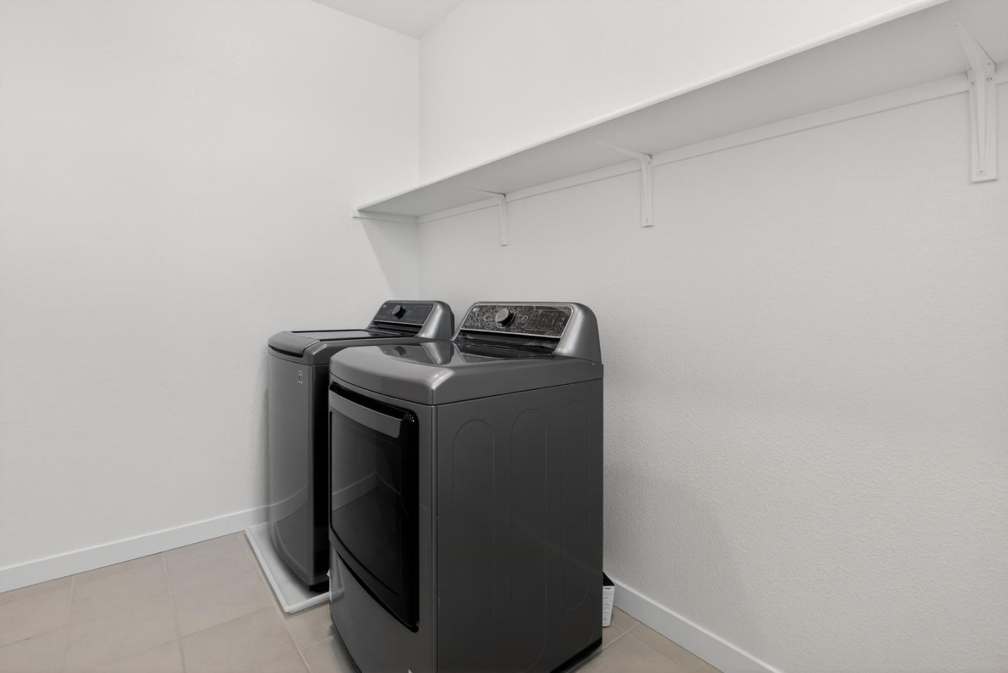 17533 Pegasus Court Lathrop, CA 95330 - Photo 38 of 59 a utility room with dryer and washer