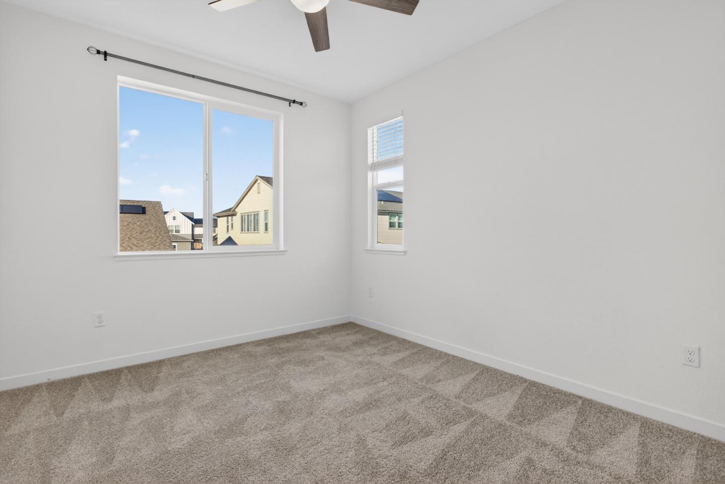 17533 Pegasus Court Lathrop, CA 95330 - Photo 39 of 59 an empty room with windows