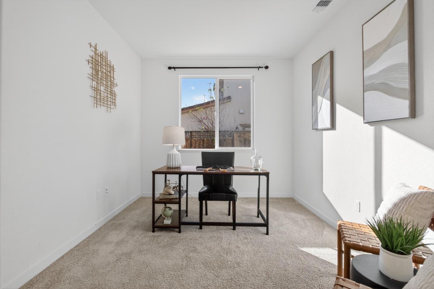 17533 Pegasus Court Lathrop, CA 95330 - Photo 7 of 59 a work room with furniture and a window