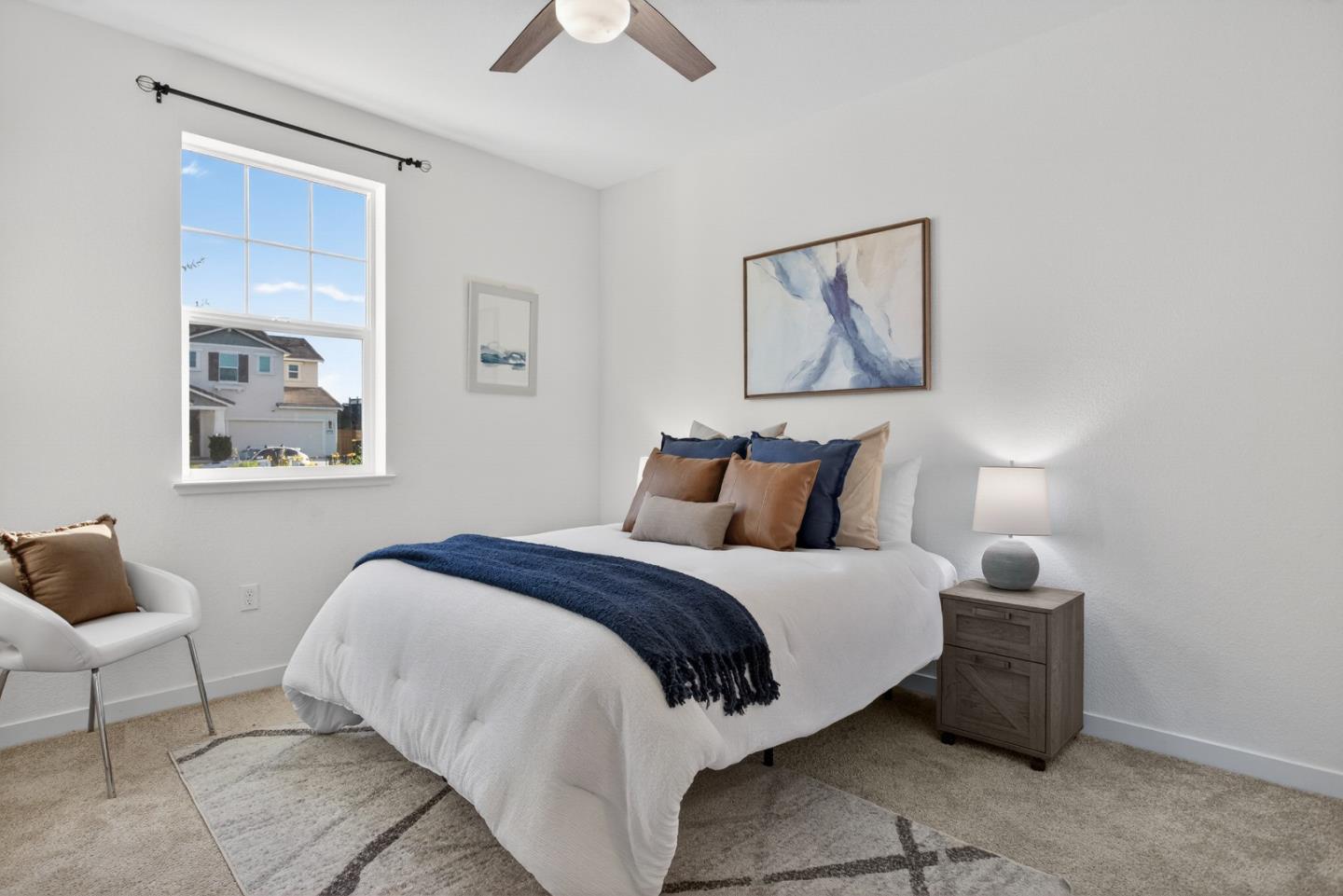 17533 Pegasus Court Lathrop, CA 95330 - Photo 9 of 59 a bedroom with a bed and a painting on the wall