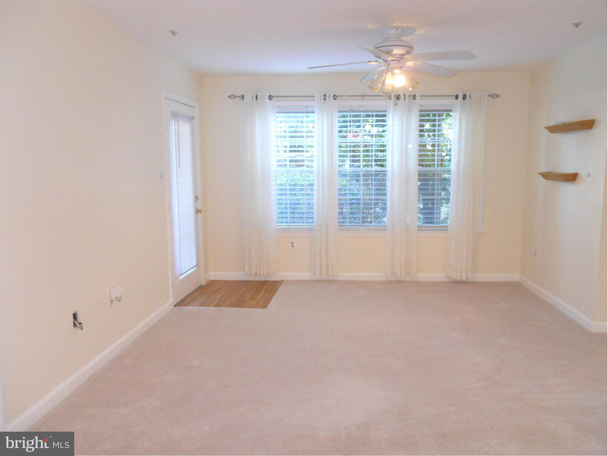 6832 Hayley Ridge Way, Unit N Baltimore, MD 21209 - Photo 14 of 30 Freshly painted large living room