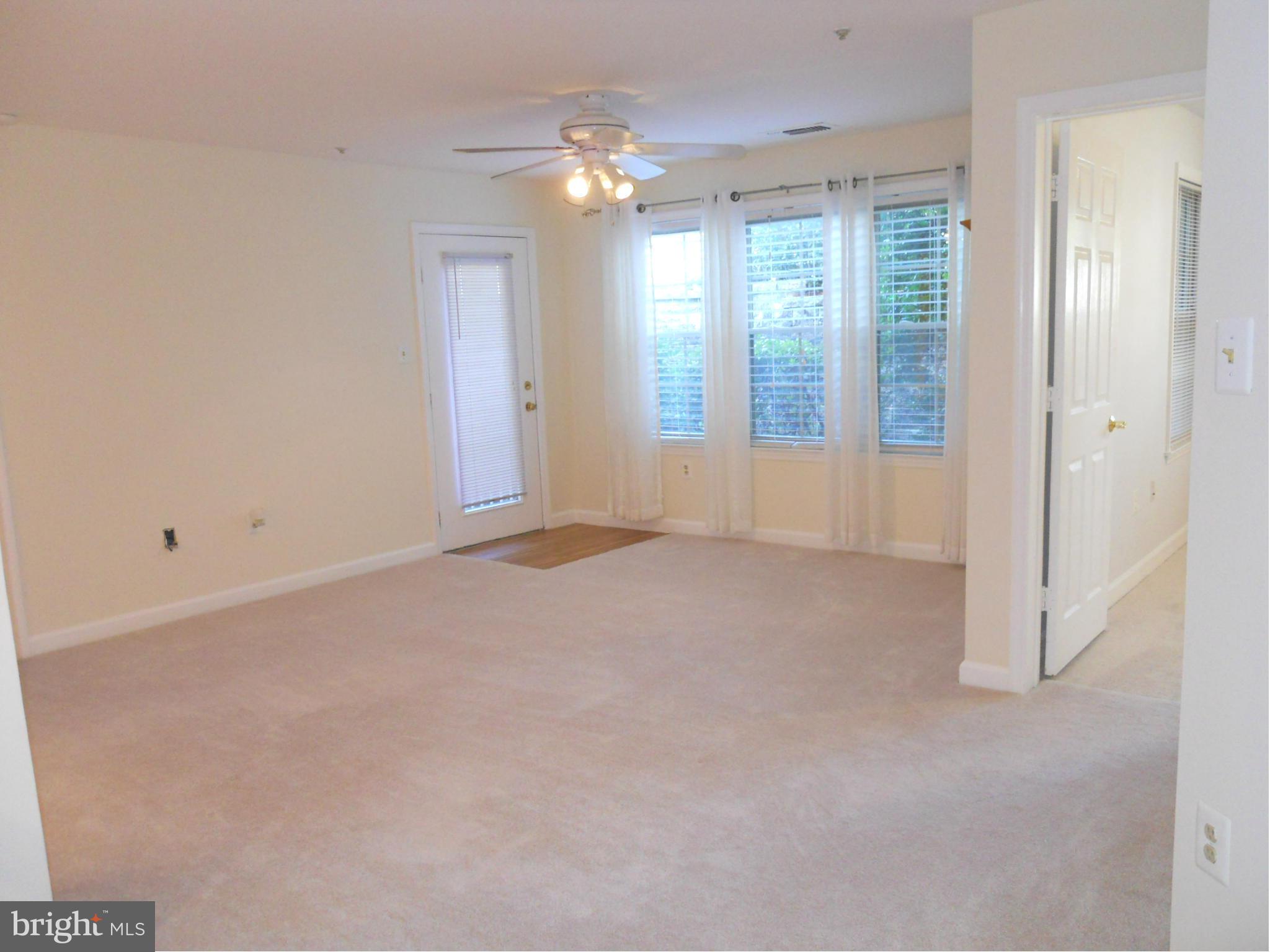 6832 Hayley Ridge Way, Unit N Baltimore, MD 21209 - Photo 15 of 30 Freshly painted large living room