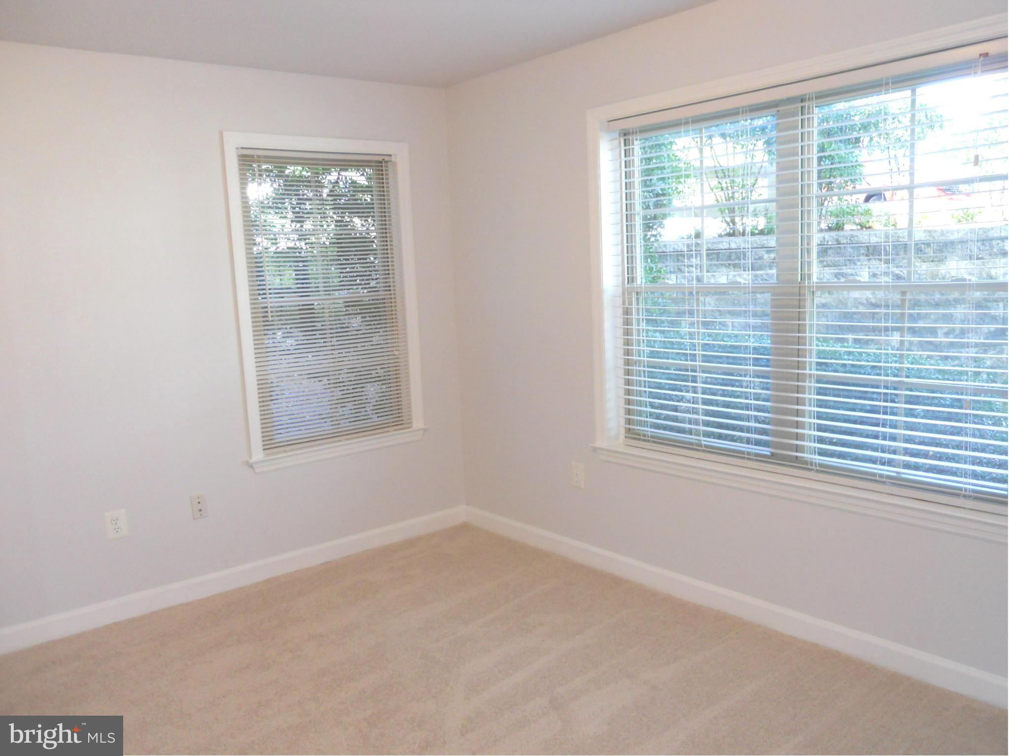 6832 Hayley Ridge Way, Unit N Baltimore, MD 21209 - Photo 21 of 30 Freshly painted second bedroom w/new carpet!