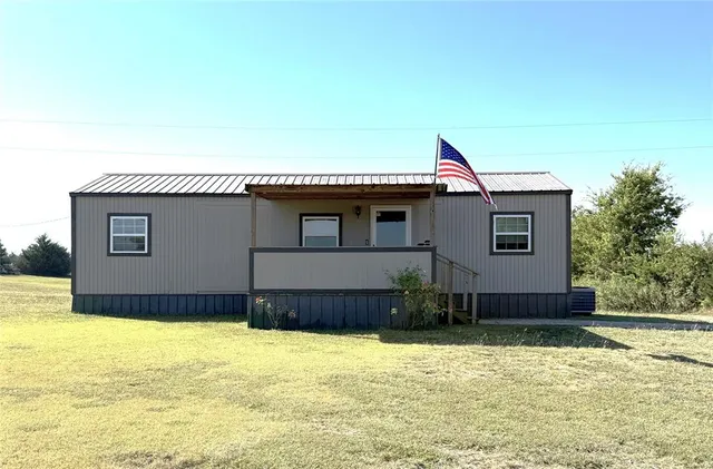 a house view with a swimming pool