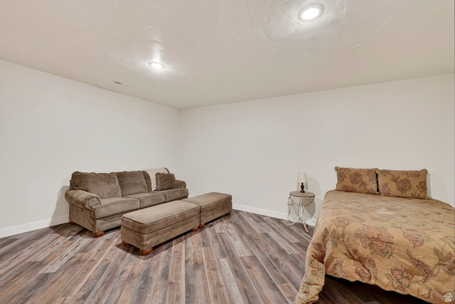 3311 West Allard Summit, UT 84772 - Photo 59 of 97 Spacious room featuring wood-finish flooring, white walls, and recessed lighting