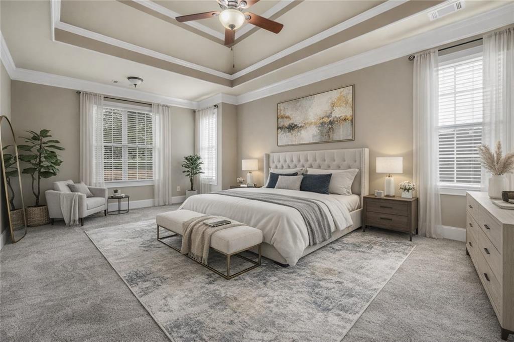 108 Caraway Road Locust Grove, GA 30248 - Photo 25 of 50 a bedroom with a bed a chandelier and a large window