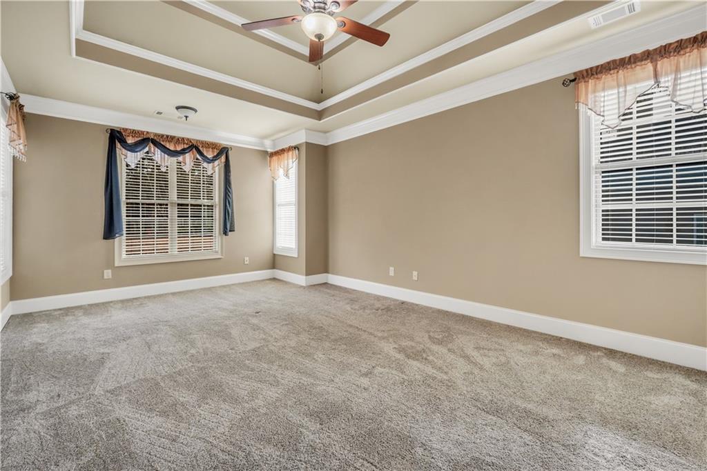 108 Caraway Road Locust Grove, GA 30248 - Photo 26 of 50 a view of an empty room with a window