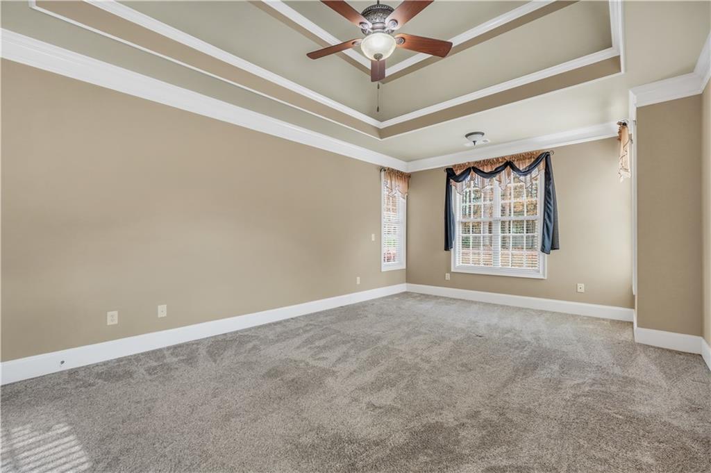 108 Caraway Road Locust Grove, GA 30248 - Photo 27 of 50 a view of an empty room with a window